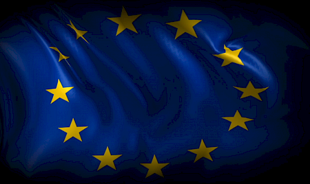 Flaga Unii Europejskiej. Żółte gwiazdy ułożone w koło na niebieskim tle